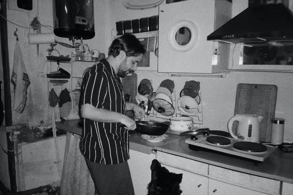 Dog owner preparing a meal