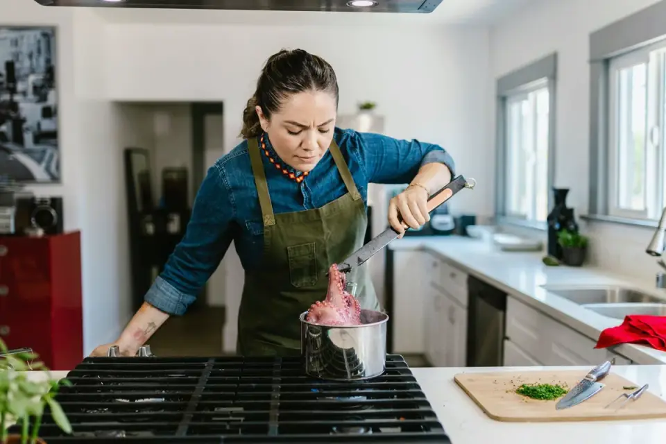 Dog owner preparing a meal