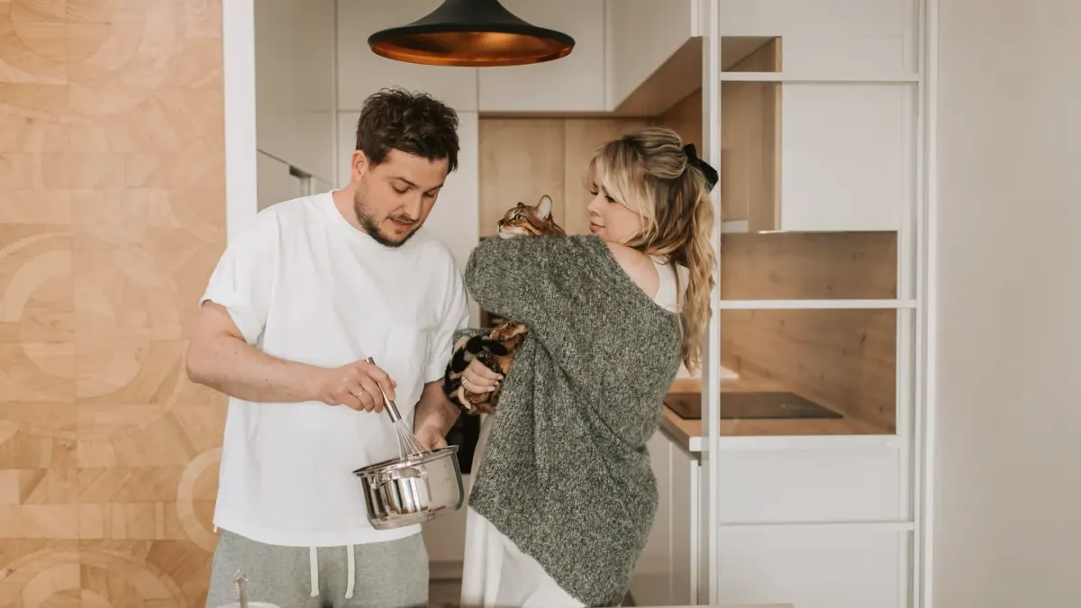 Dog owner preparing a meal