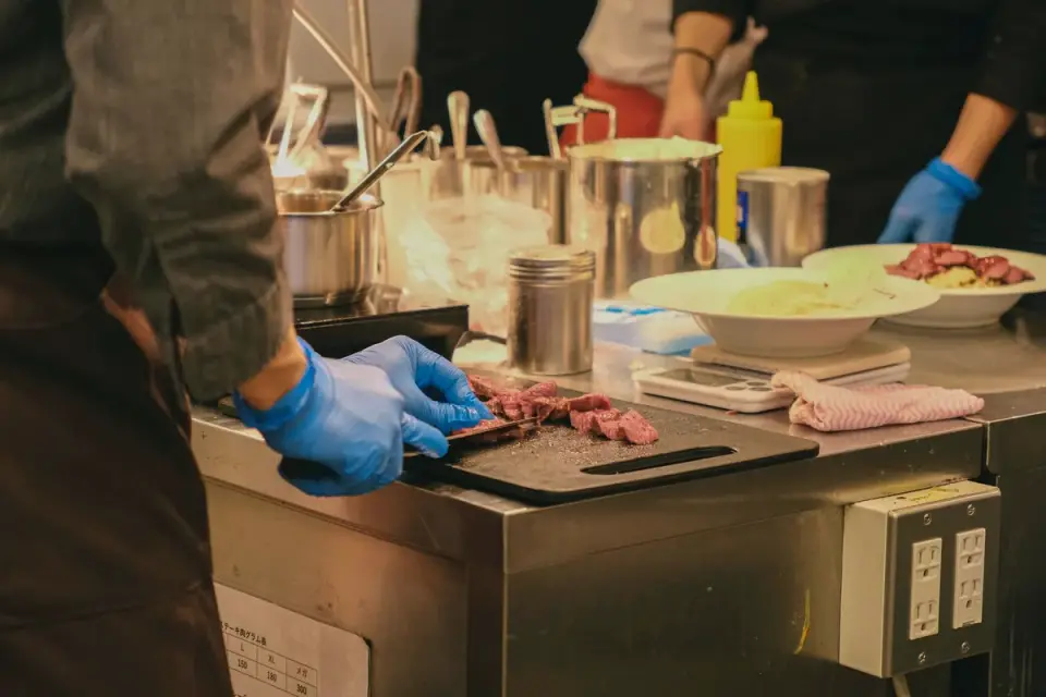 Dog owner preparing a meal
